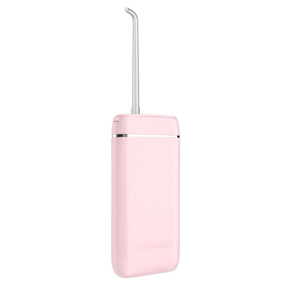 Pink dental water flosser on a white background